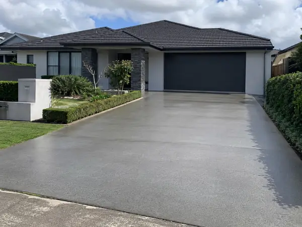 Long concrete driveway beside a home in Prospect