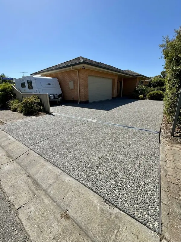 Exposed aggregate driveway with a strip drain at the garage, Aberfoyle Park
