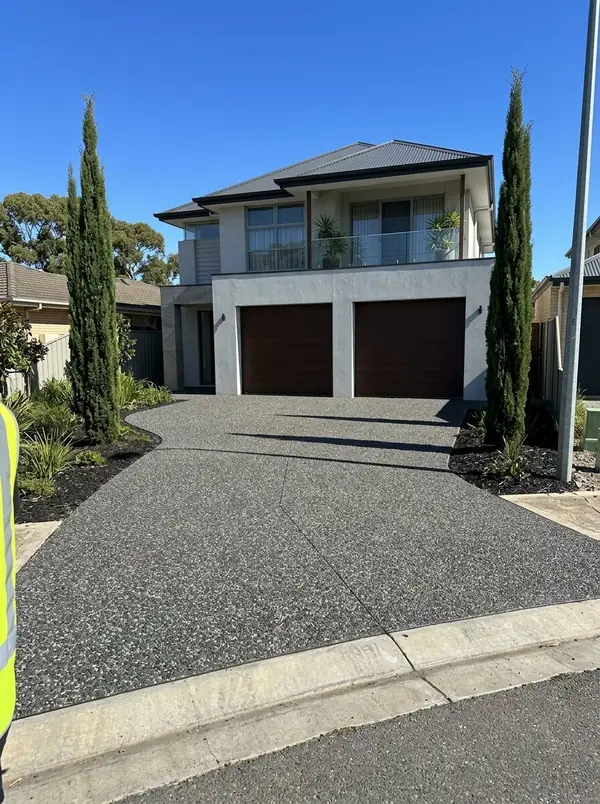 Charcoal exposed aggregate driveway to a double garage, Glenelg