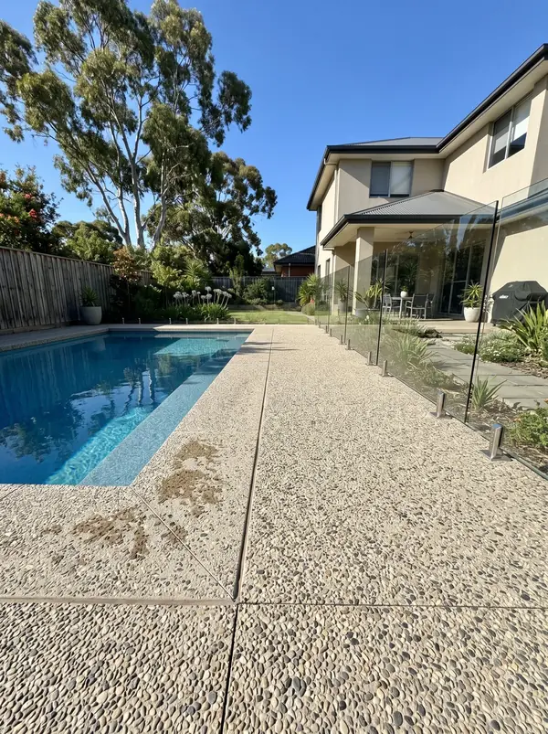 Oatmeal exposed aggregate pool surround, Burnside
