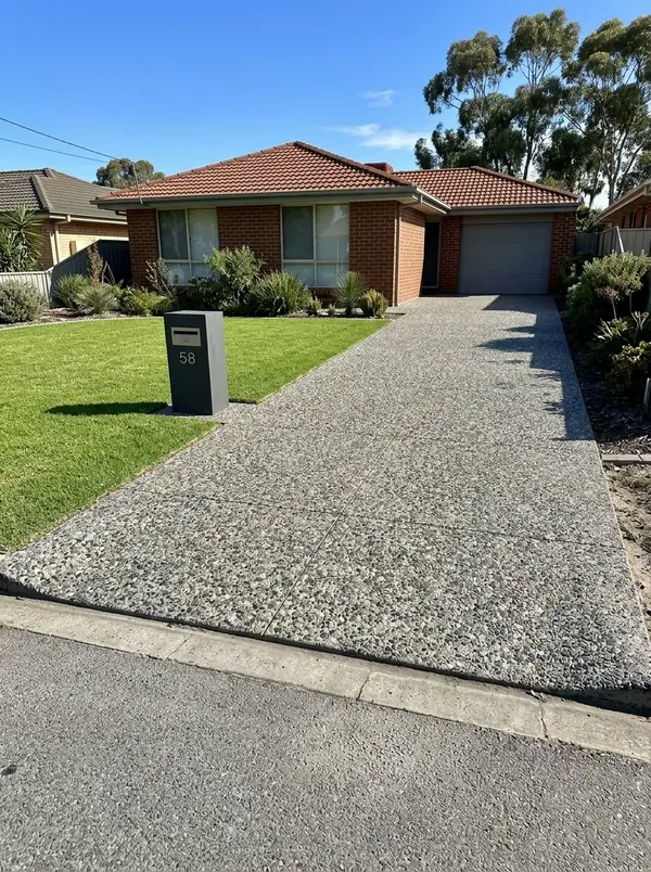 Exposed aggregate driveway and crossover at a brick home, Somerton Park
