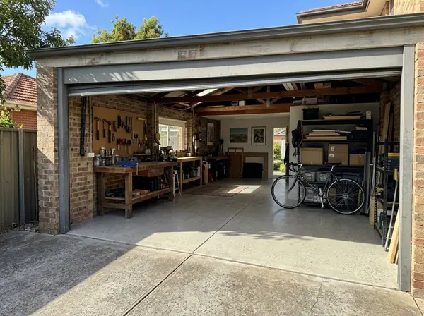Honed concrete floor inside a converted garage studio
