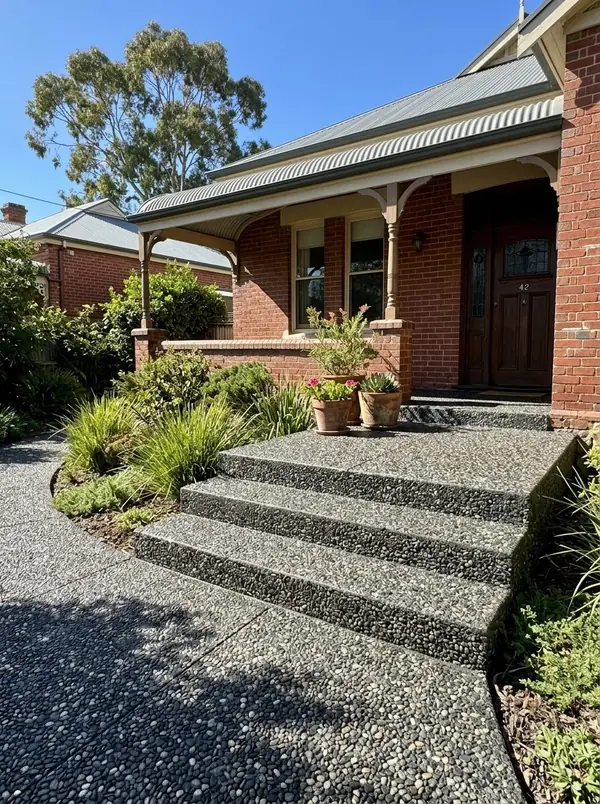 Charcoal exposed aggregate front steps and porch at a 1920s bungalow, Mitcham