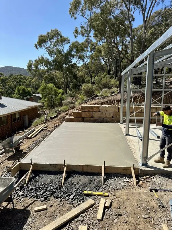 Shed slab cut into a terrace on a sloping block, Belair