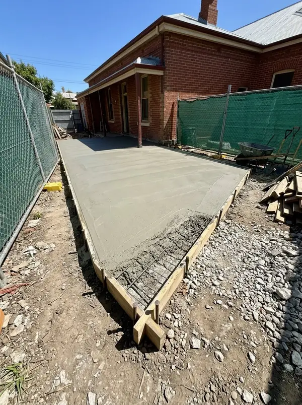 Slab for a rear extension behind a villa, Stepney