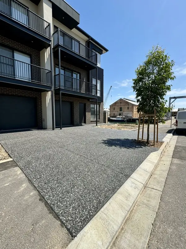 Charcoal exposed aggregate driveway at a new townhouse near the wharves, Port Adelaide