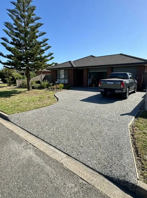 Exposed aggregate driveway and crossover at a brick veneer home, Largs Bay