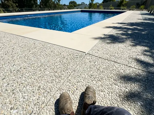 Oatmeal exposed aggregate, pool surrounds