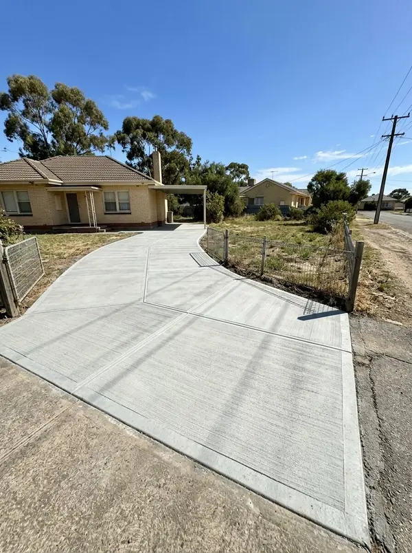New concrete driveway and carport apron at a 1950s Housing Trust home, Salisbury North