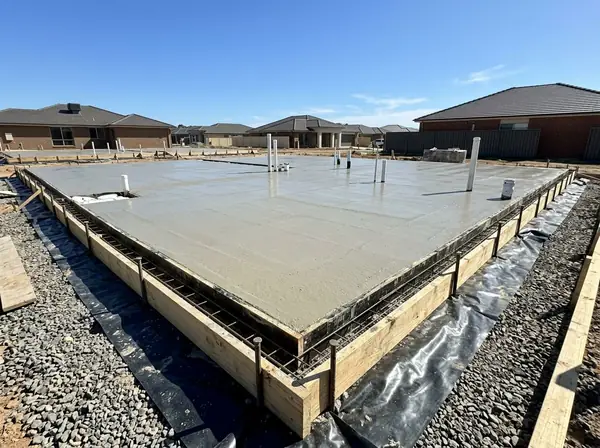 A house slab set up ready to pour with waffle pods, mesh, edge beams and vapour barrier