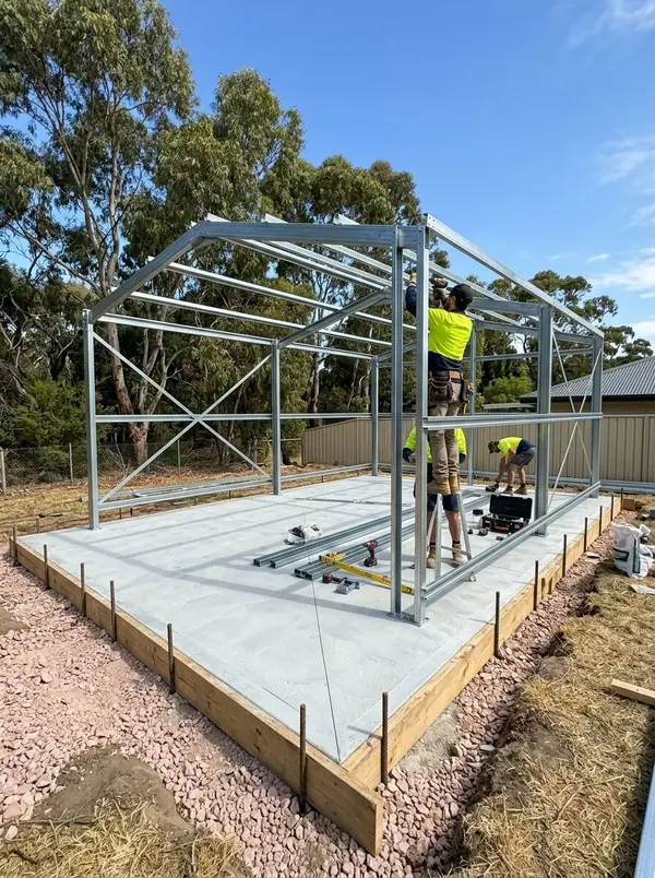 Finished shed slab with the steel frame going up, Golden Grove