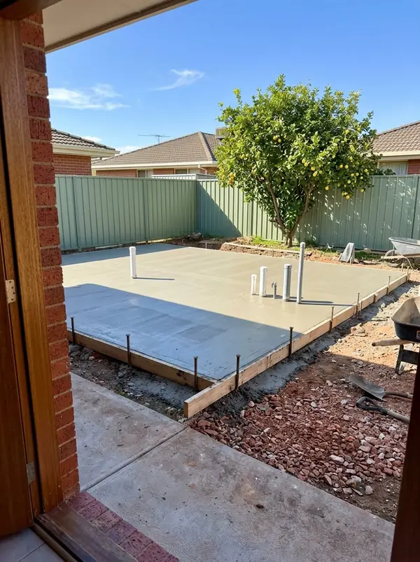 Granny flat slab with plumbing stubs in a backyard, Salisbury