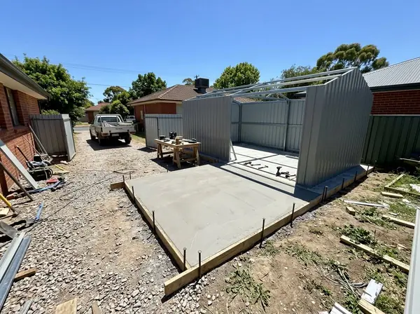 Finished shed slab with a Colorbond shed half built on it