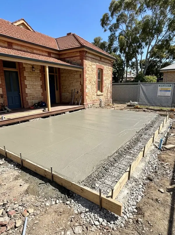 Rear extension slab behind a sandstone villa, Parkside